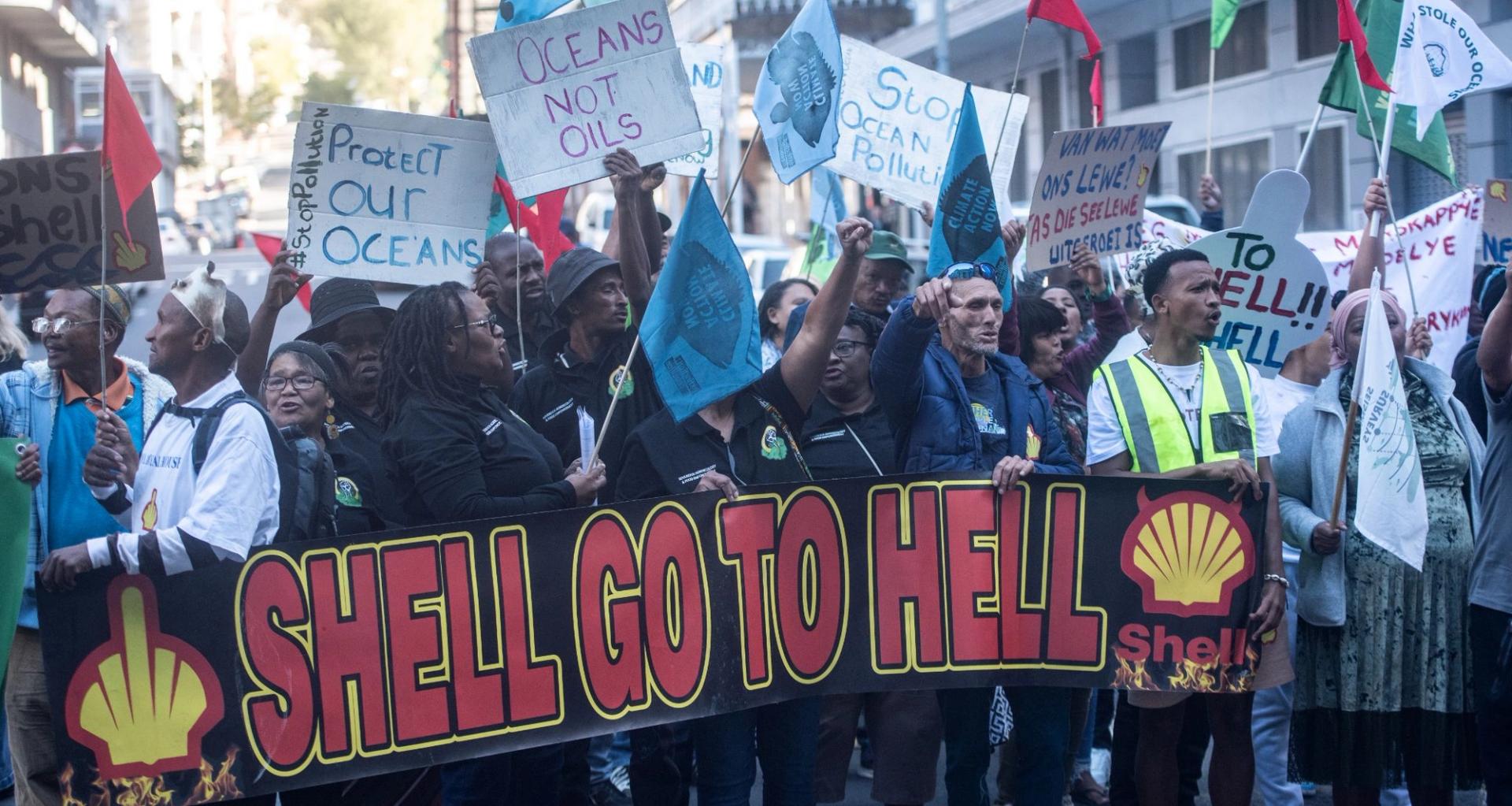 Activists protest outside Cape Town High Court in 2025.