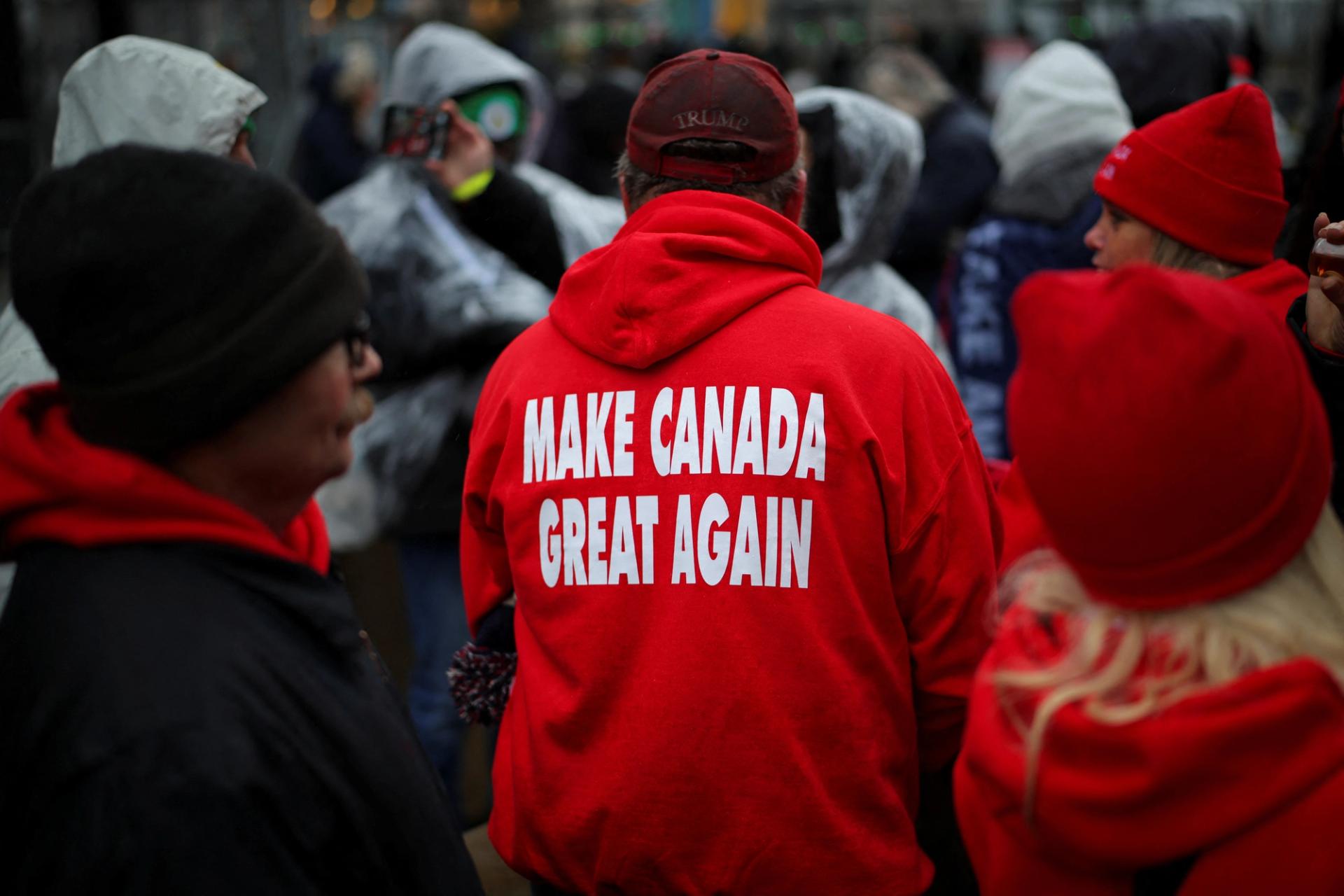 A supporter wears clothing with “Make Canada Great Again” in DC.