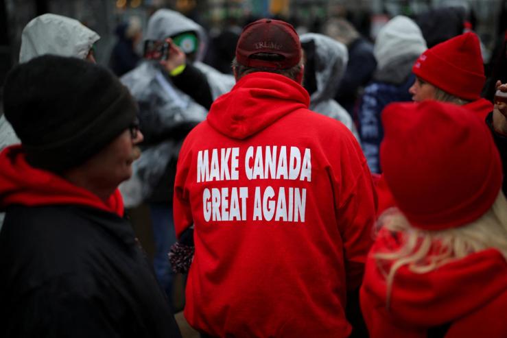 A supporter wears clothing with “Make Canada Great Again” in DC.
