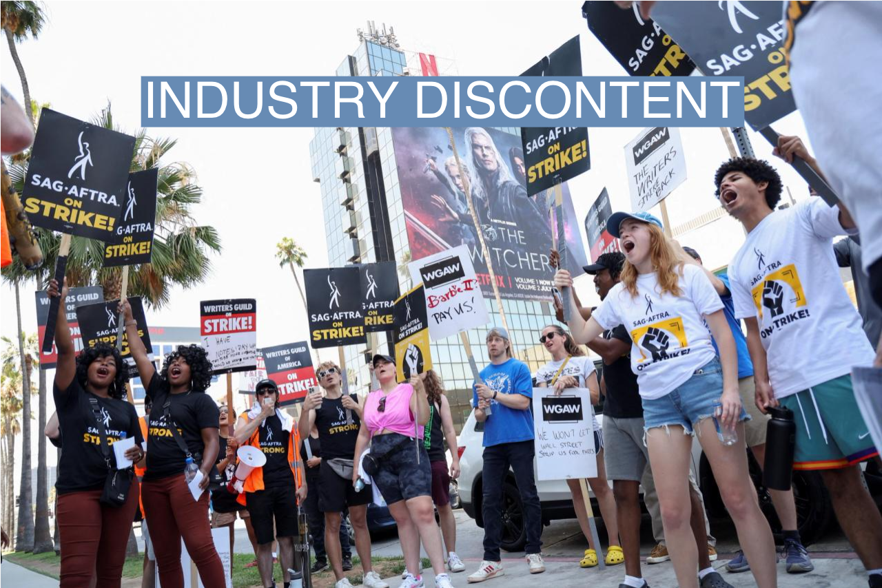 Gabrielle and Rachel Newman, also known as the Newman twins, and other demonstrators attend SAG-AFTRA actors’ and Writers Guild of America (WGA) writers’ ongoing strike, outside Netflix offices in Los Angeles, California, U.S., August 4, 2023. REUTERS/Mario Anzuoni