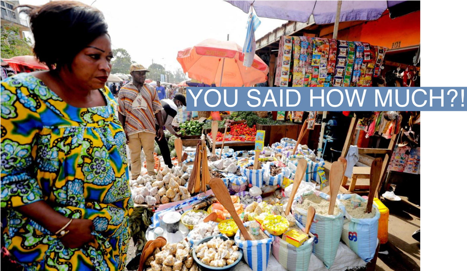 A woman shops at the Mvog Ada market in Yaounde, Cameroon