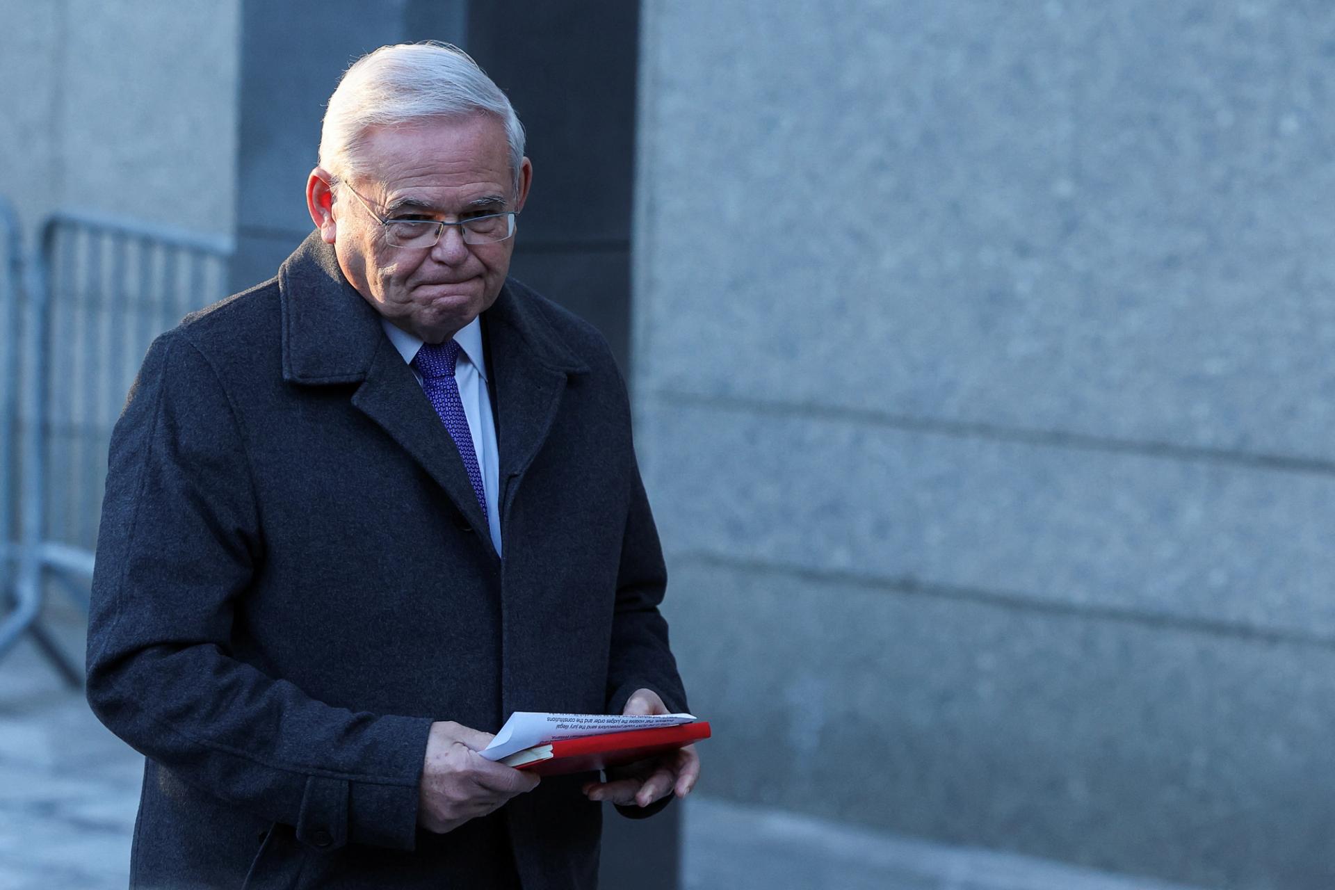 Former U.S. Senator Robert Menendez (D-NJ) walks after speaking to the press, as he leaves Federal Court, New York. 