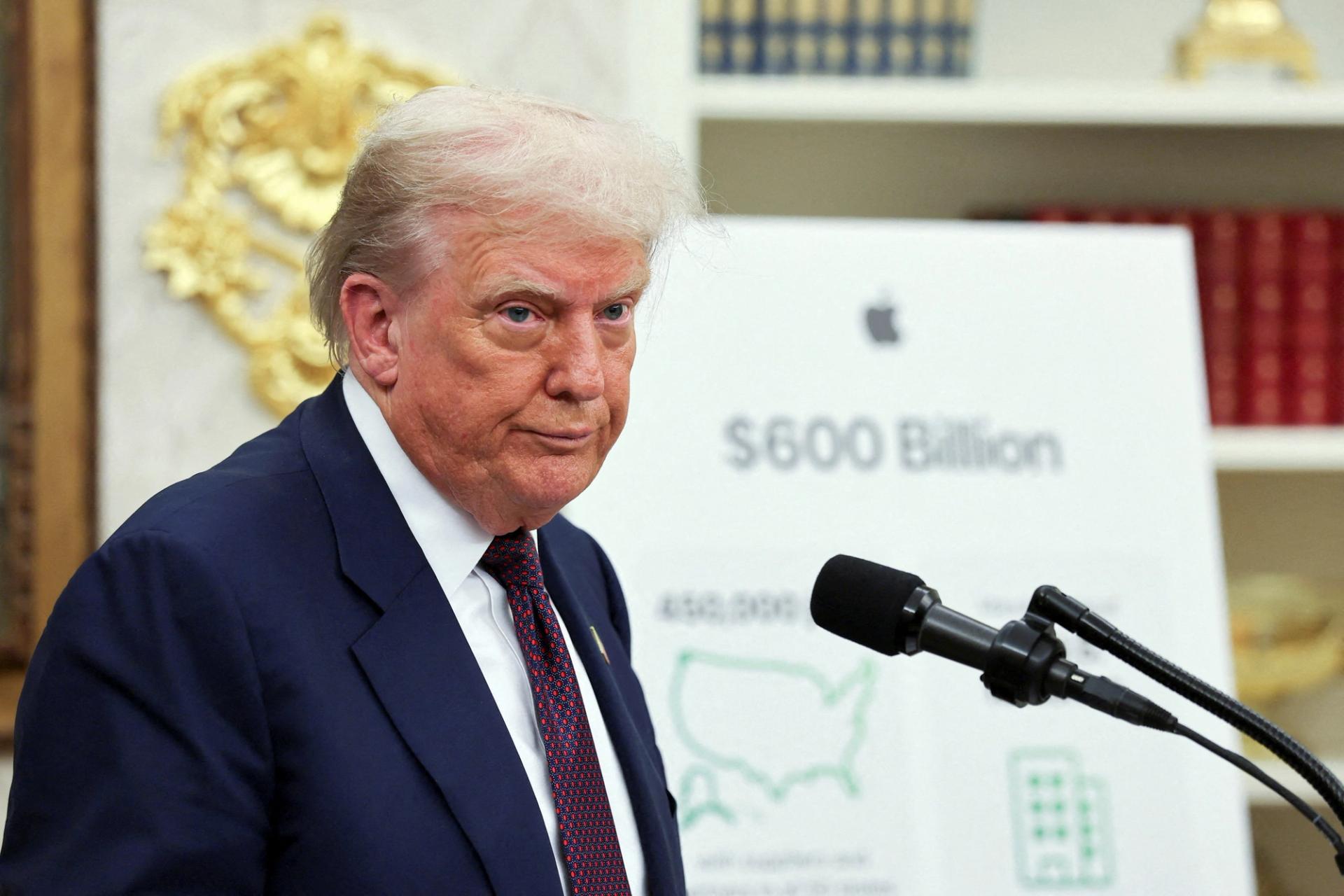 US President Donald Trump speaks to media inside the Oval Office.