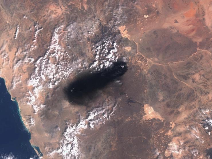 Black smoke rising from an area of Saudi Arabia’s East-West oil pipeline