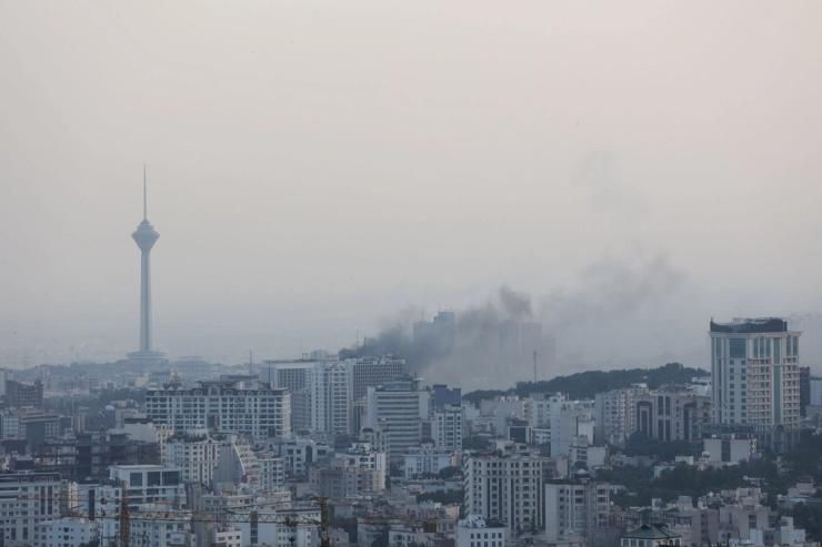 Smoke rises in Tehran.