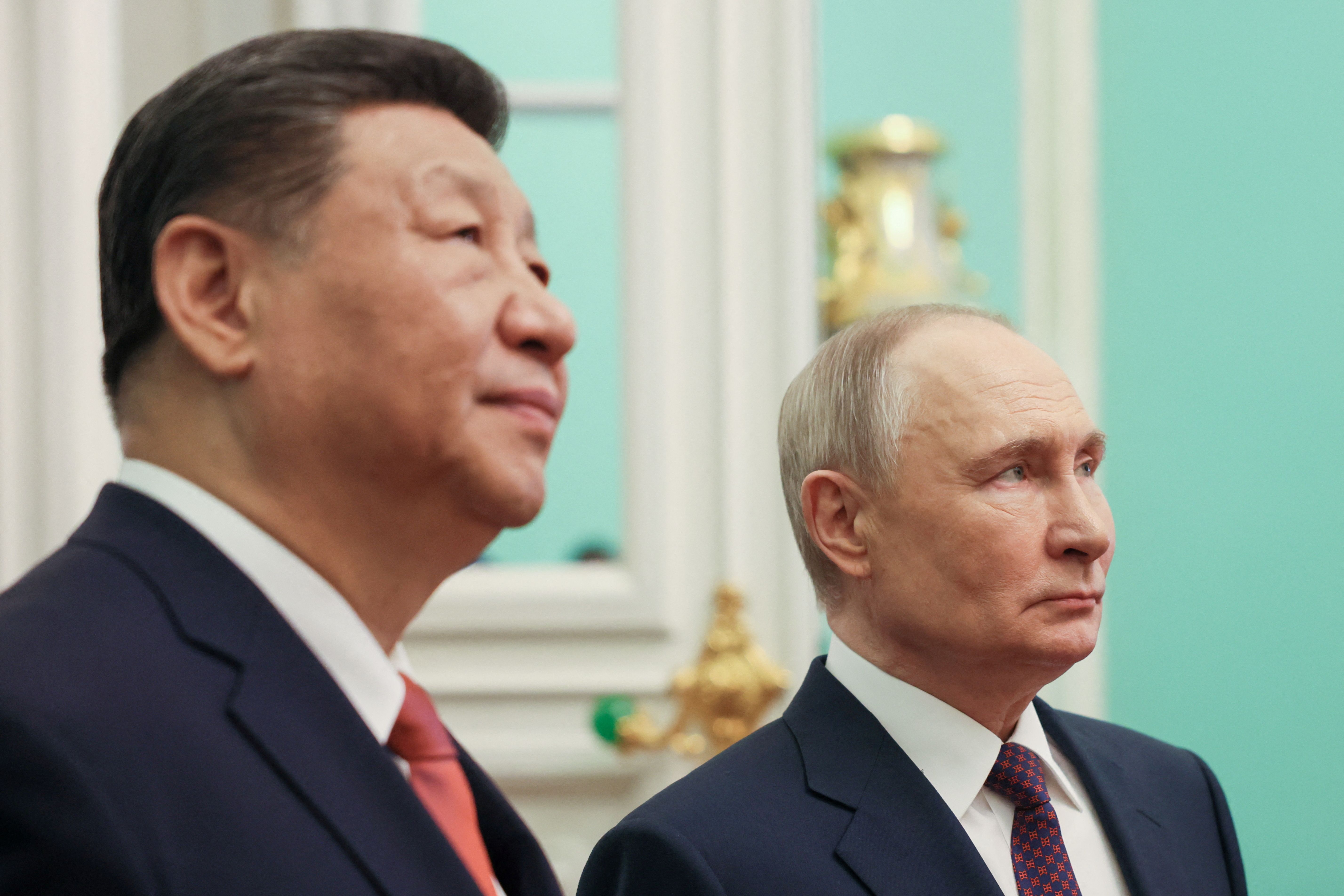 Russian President Vladimir Putin and Chinese President Xi Jinping meet following their talks in Moscow, Russia, May 8, 2025. 
