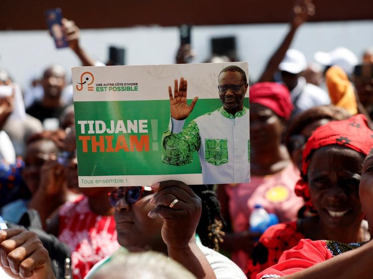 Supporters of the PDCI (Democratic Party of Cote d’Ivoire) protest against the decision to remove their leader Tidjane Thiam from the electoral list at their headquarters in Abidjan on April 24, 2025.