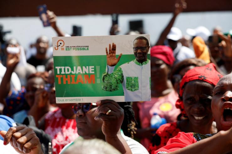 Supporters of the PDCI (Democratic Party of Cote d’Ivoire) protest against the decision to remove their leader Tidjane Thiam from the electoral list at their headquarters in Abidjan on April 24, 2025.