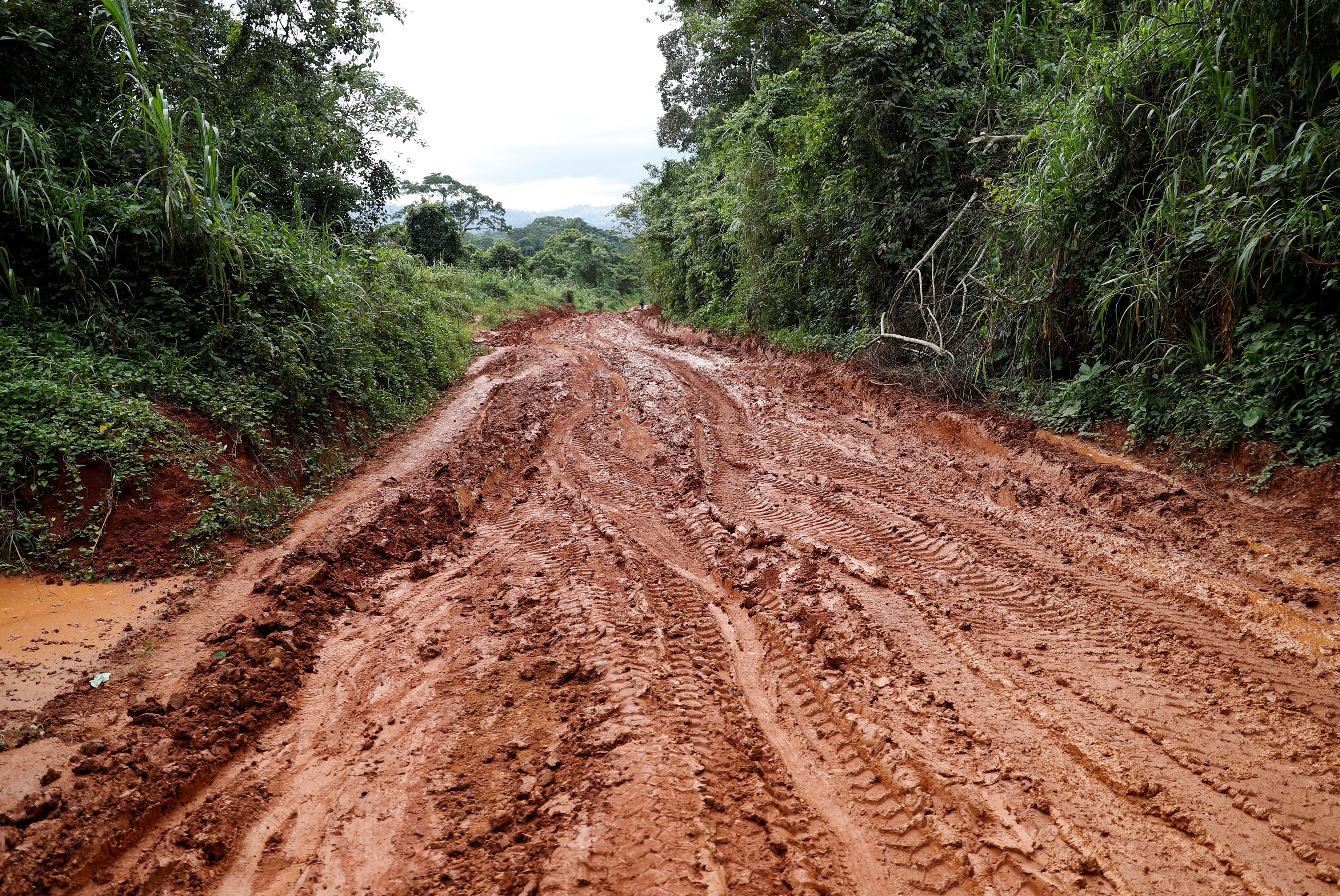 A muddy road is seen near town of Mobwalu in Ituri province, eastern Democratic Republic of Congo.