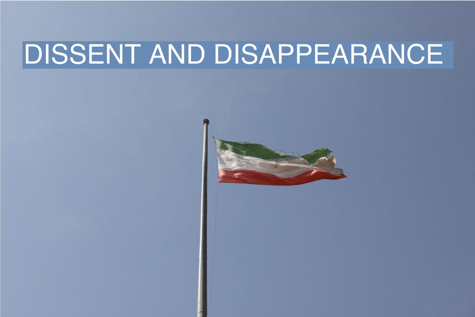 The Iranian flag is seen flying over Evin prison in Tehran