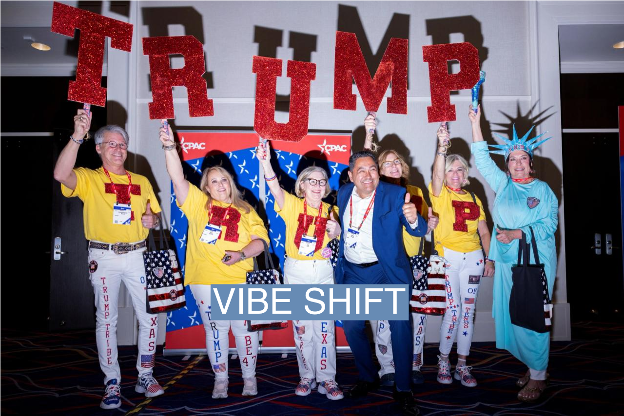 A group of Trump supporters hold up signs at the annual Conservative Political Action Conference (CPAC) in National Harbor, Maryland, on Feb. 22, 2024. 