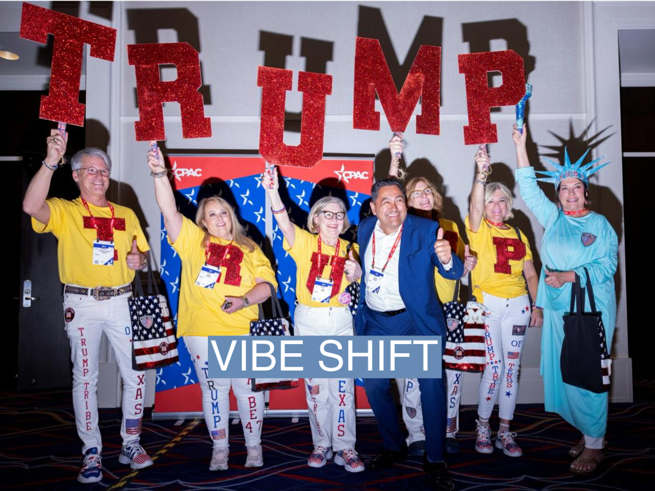 A group of Trump supporters hold up signs at the annual Conservative Political Action Conference (CPAC) in National Harbor, Maryland, on Feb. 22, 2024. 