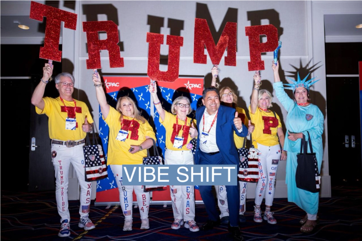 A group of Trump supporters hold up signs at the annual Conservative Political Action Conference (CPAC) in National Harbor, Maryland, on Feb. 22, 2024.