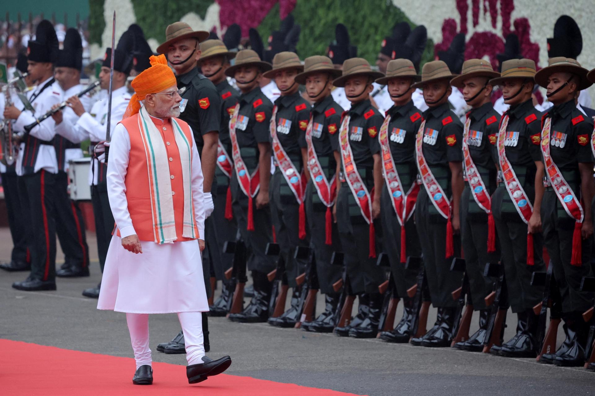 India’s Prime Minister Narendra Modi inspects an honour guard.