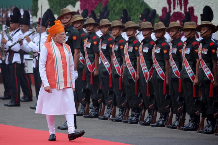 India’s Prime Minister Narendra Modi inspects an honour guard.