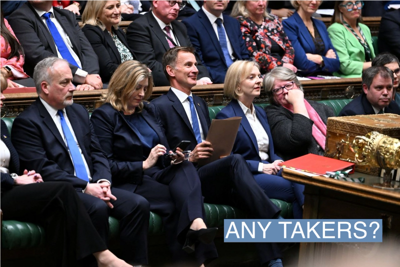 British Chancellor of the Exchequer Jeremy Hunt, next to British Prime Minister Liz Truss and Leader of the House of Commons Penny Mordaunt, reacts at the House of Commons in London