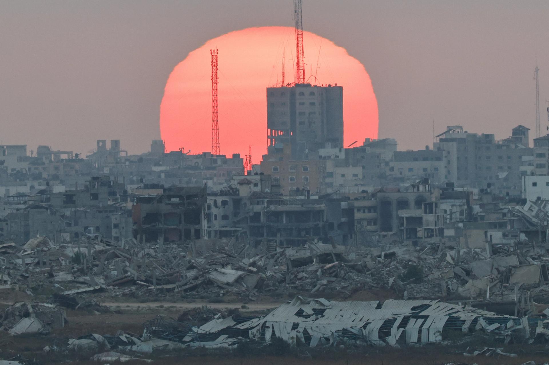 The sun sets over Gaza, as seen from Israel.