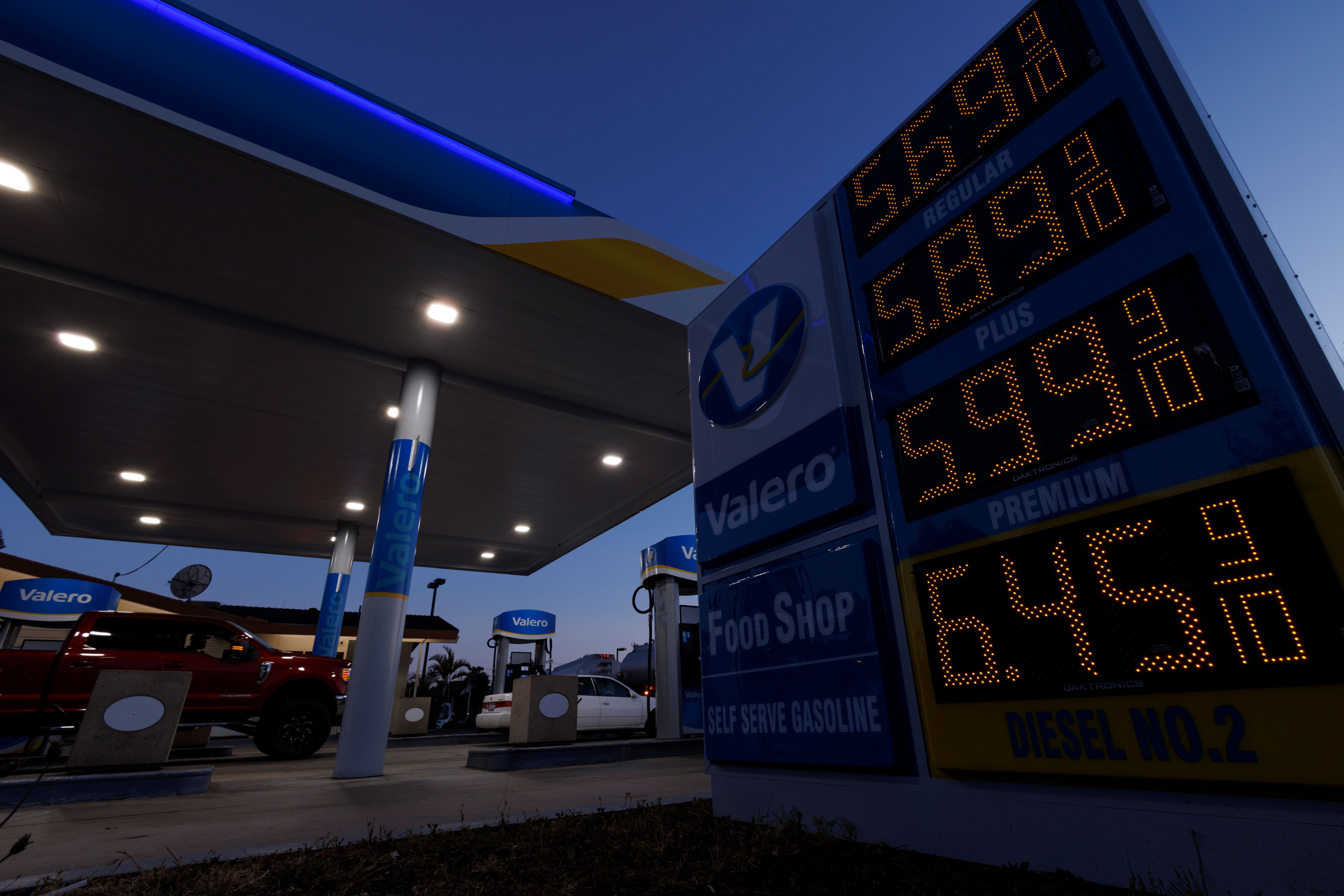 Gasoline prices are displayed as fuel costs continues to climb close to record setting territory in Encinitas, California.