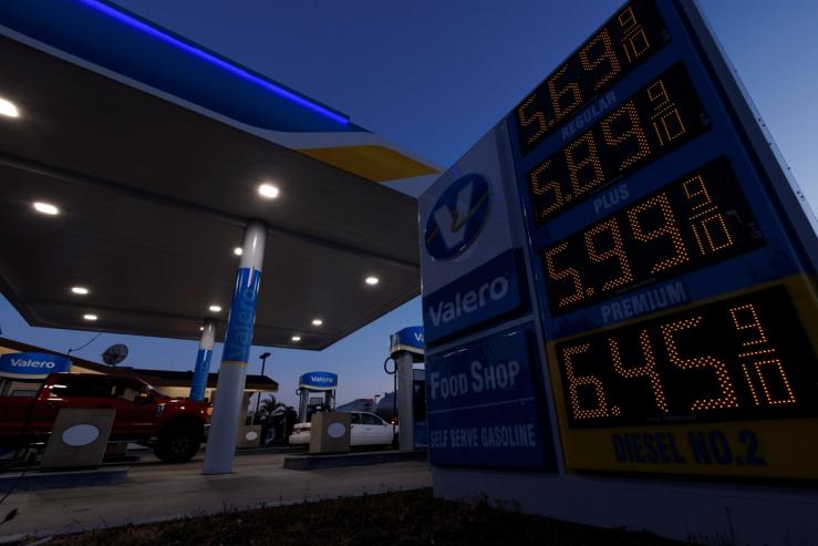 Gasoline prices are displayed as fuel costs continues to climb close to record setting territory in Encinitas, California.
