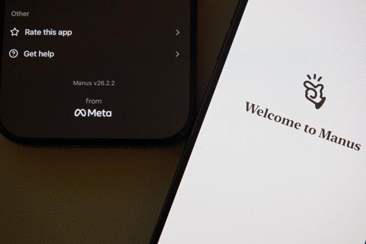 The Manus AI agent app is displayed on mobile phones with the logo of U.S. tech giant Meta in the app interface, in this illustration picture taken