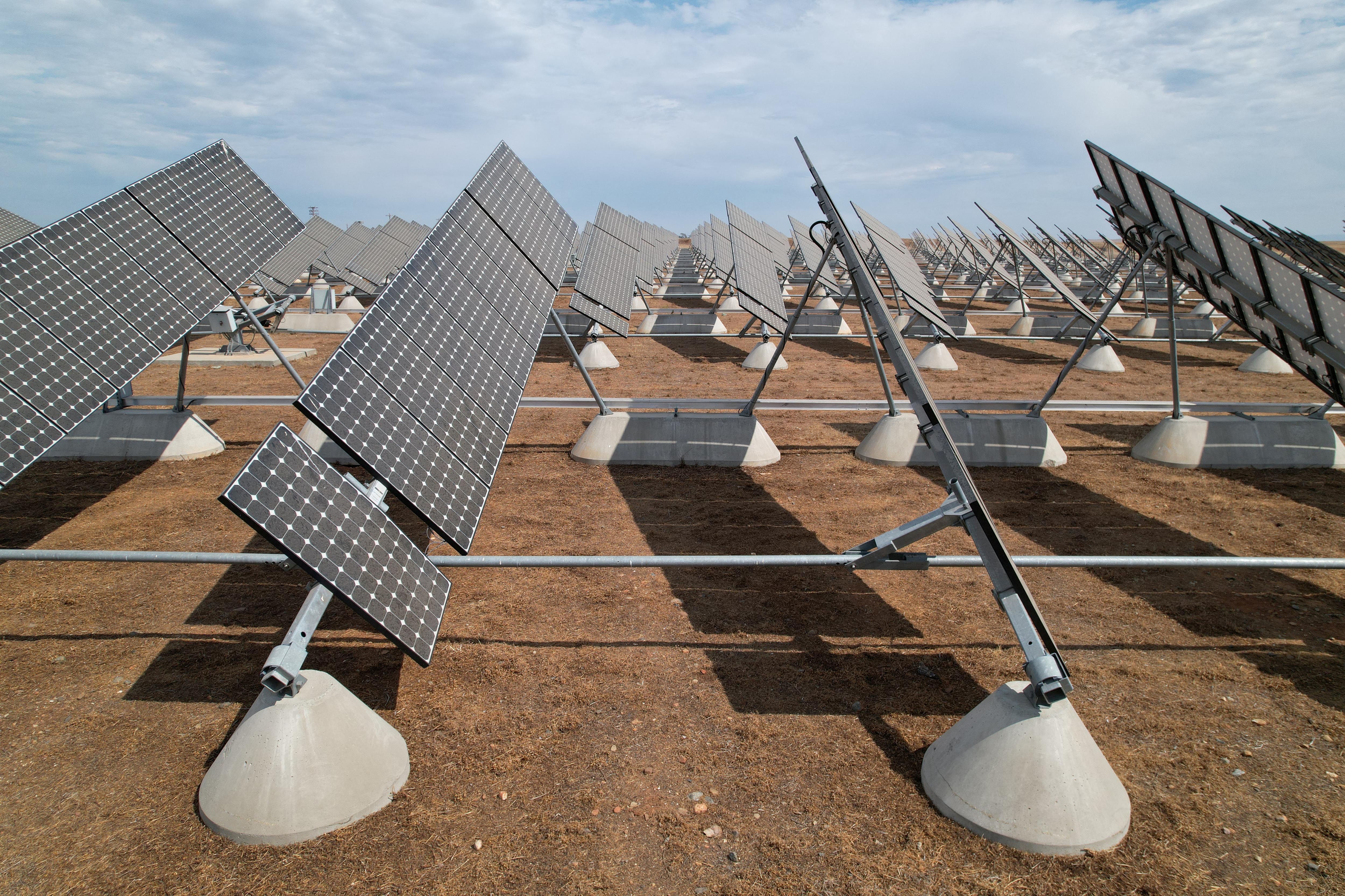 Solar panels are set up in the solar farm at the University of California, Merced, in Merced, California.