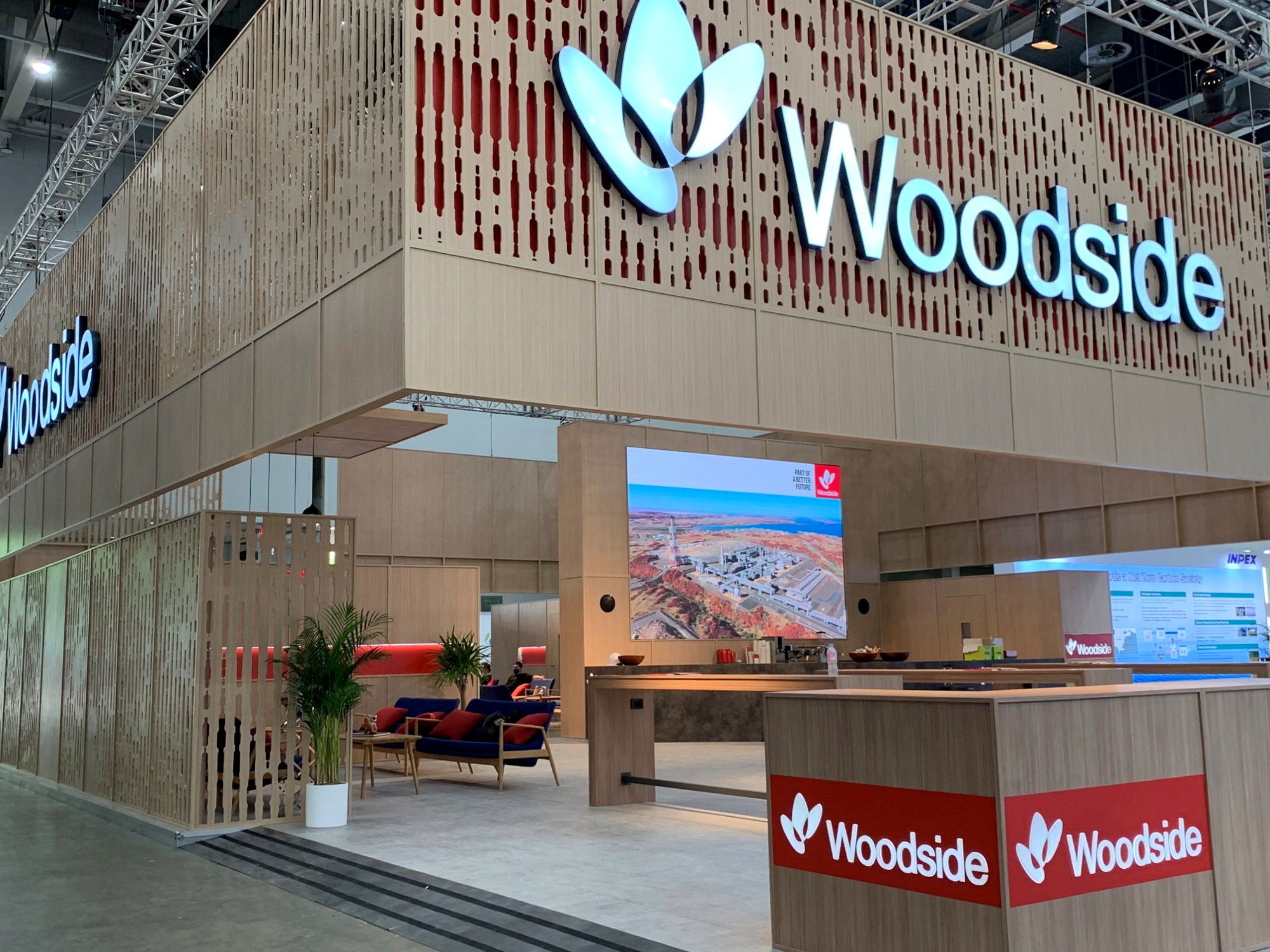 Australia’s Woodside Energy Group’s exhibition booth is seen at the World Gas Conference 2022 in Daegu, South Korea May 23, 2022. REUTERS/Florence Tan/File Photo