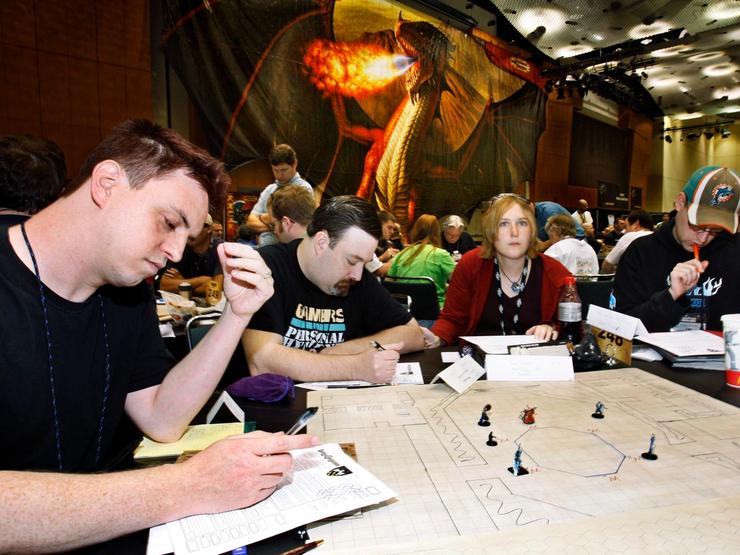 People playing Dungeons and Dragons.