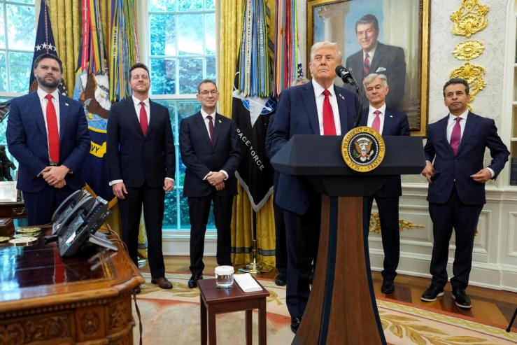 Trump in Oval Office with advisors and Pfizer CEO Bourla.