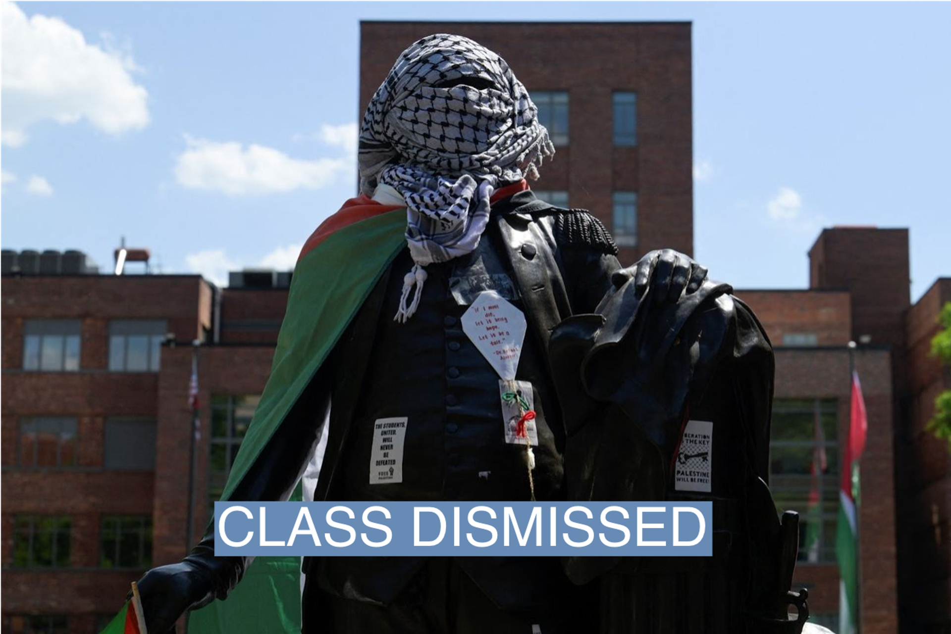 A statue of George Washington tied with a Palestinian flag and a keffiyeh is pictured inside a pro-Palestinian encampment at George Washington University in Washington on May 2, 2024.