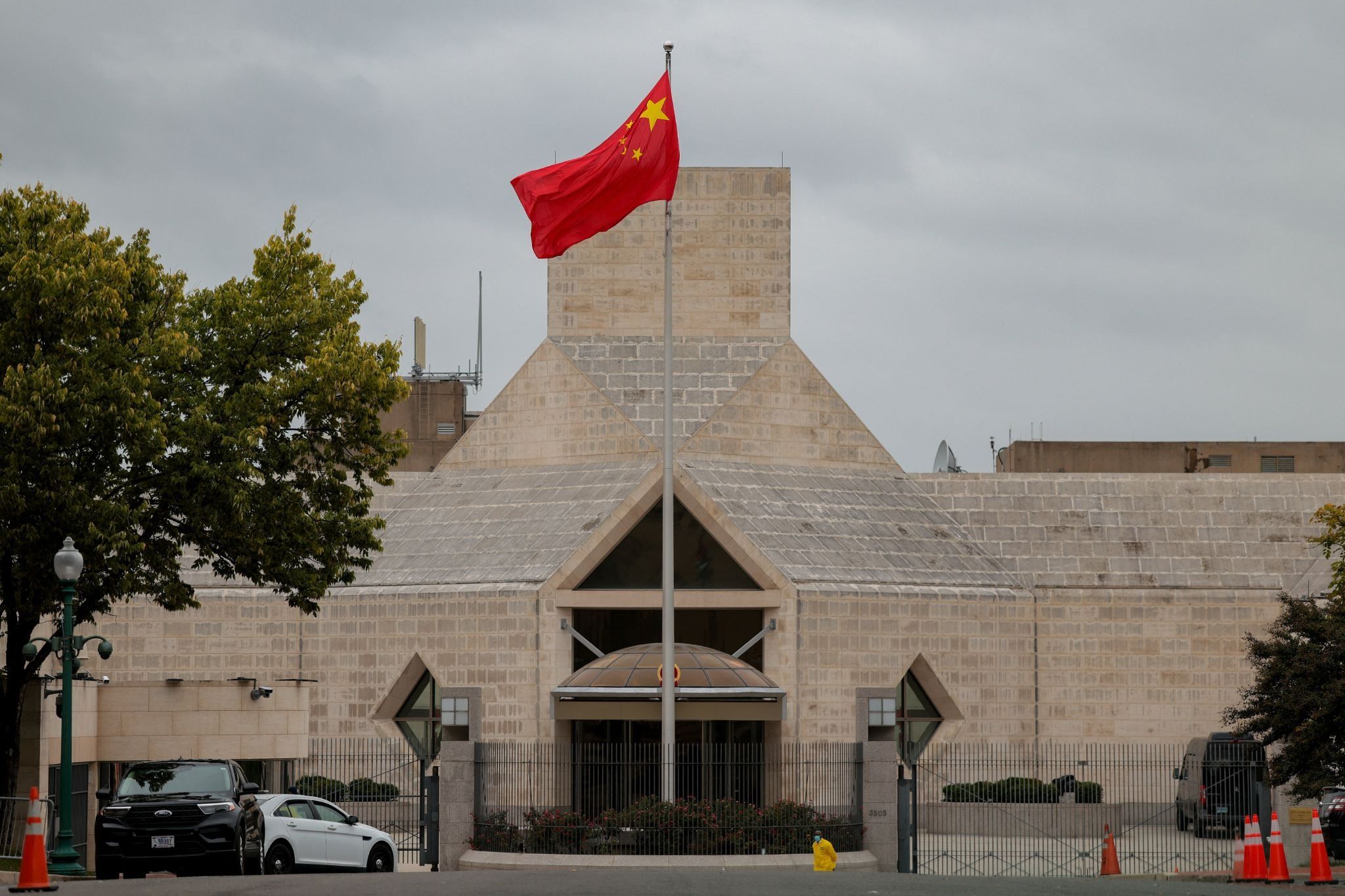 A building with a Chinese flag outside.