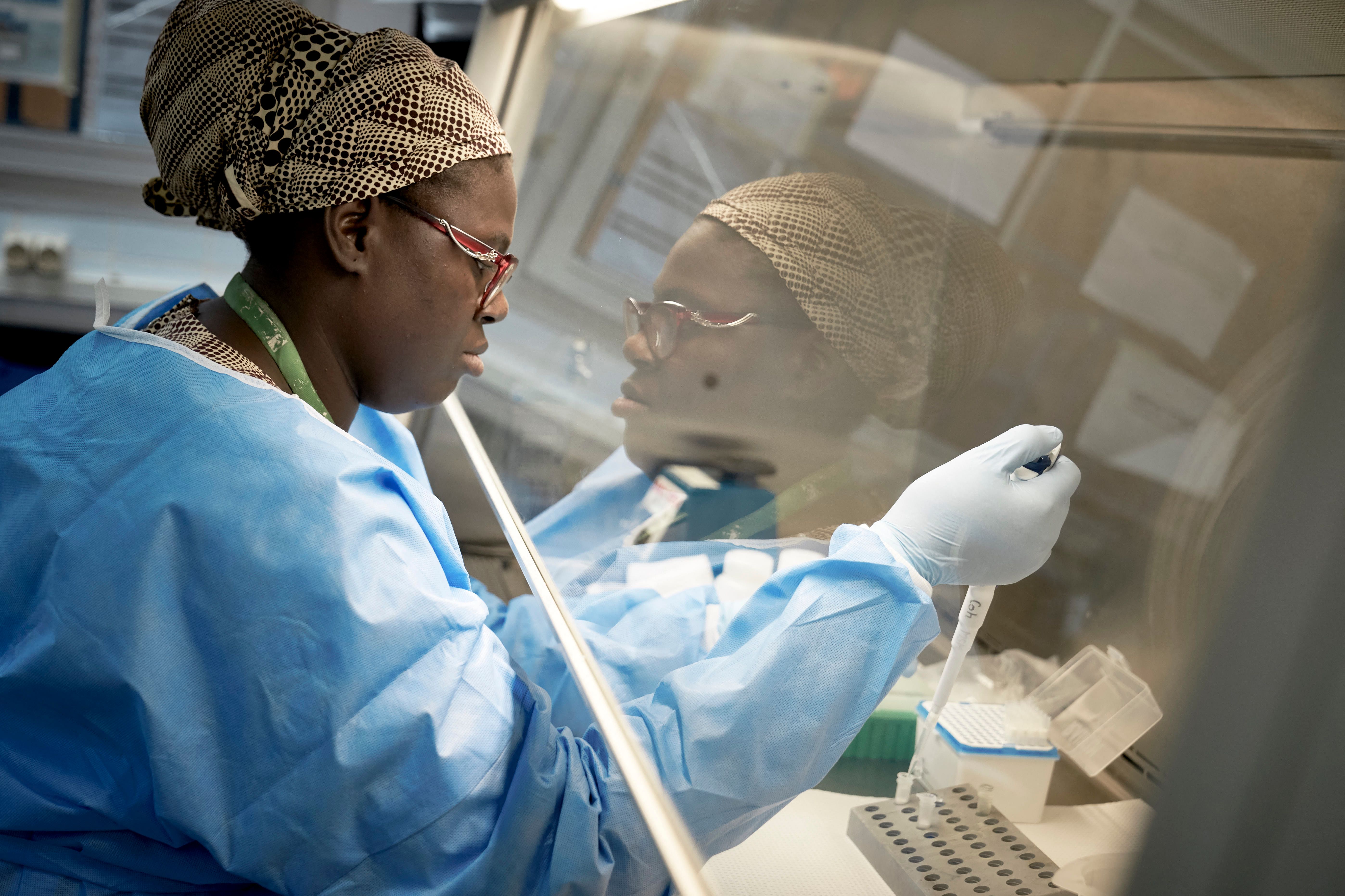 A Malian researcher conducts a COVID-19 coronavirus test at the University Clinical Research Center of Bamako.