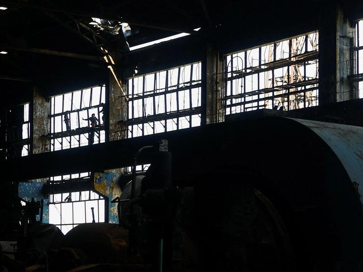 Employees work at a thermal power plant damaged multiple times during Russian missile and drone strikes.