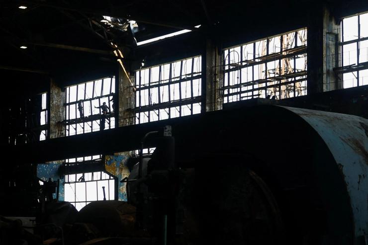 Employees work at a thermal power plant damaged multiple times during Russian missile and drone strikes.