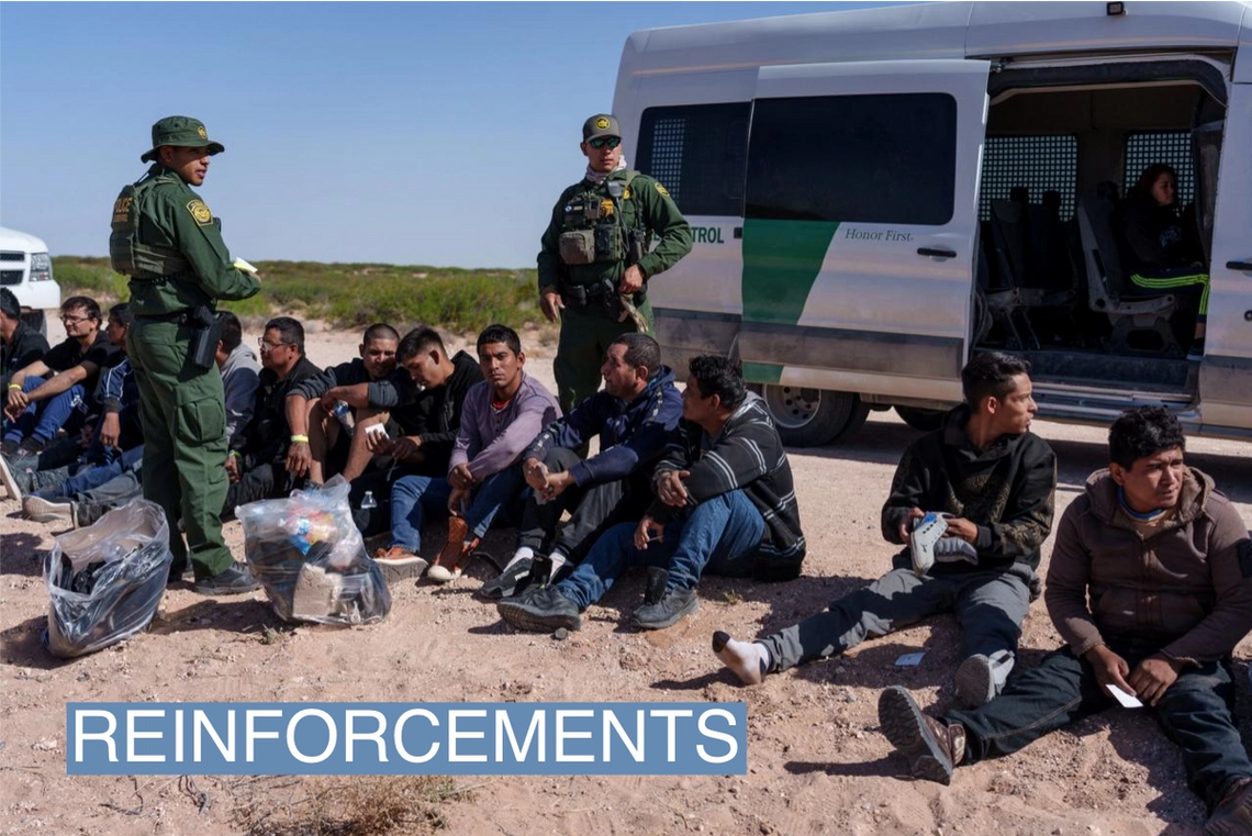 A group of migrants apprehended at the U.S.-Mexico border.