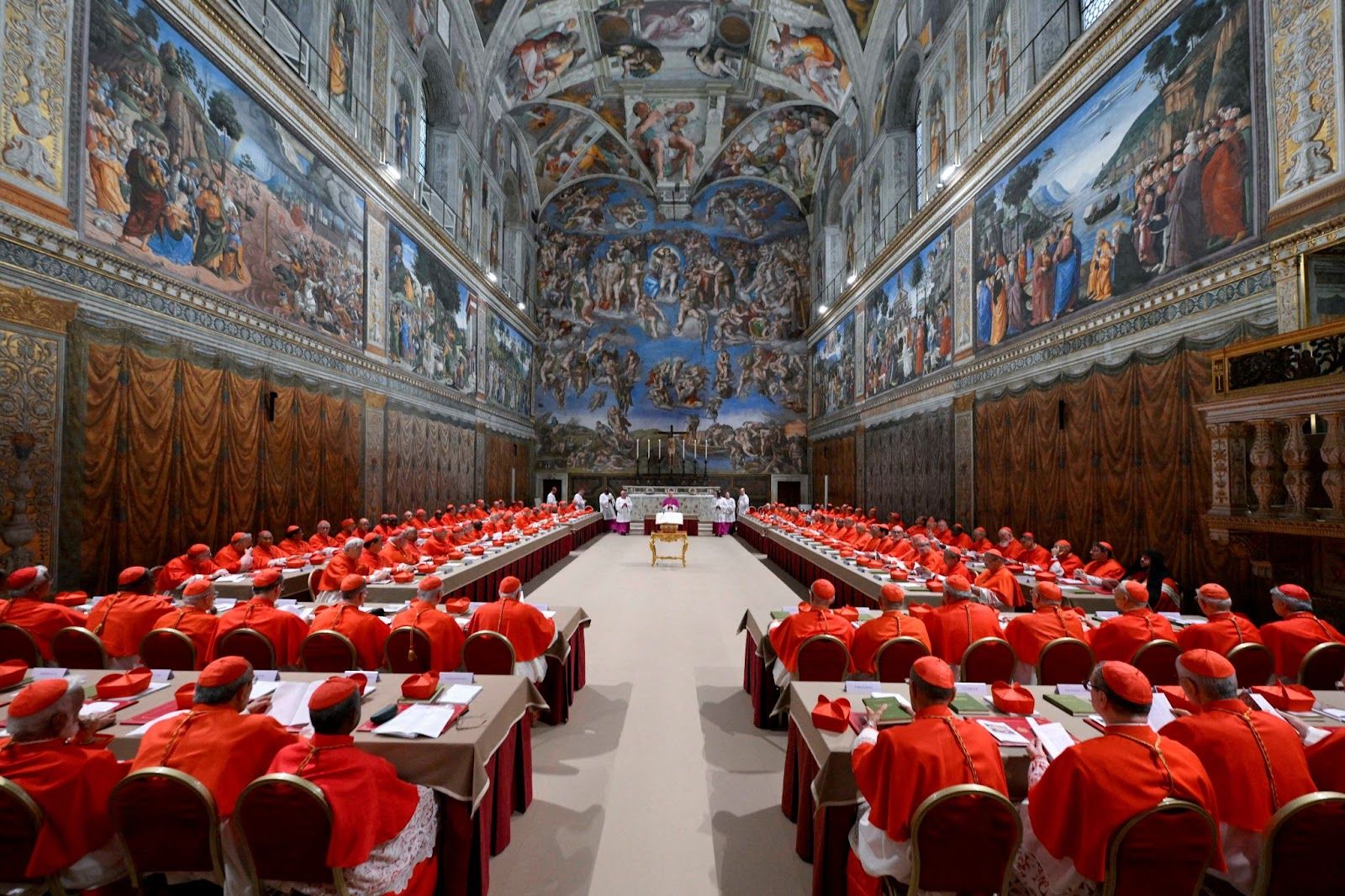 Cardinals pray in the Sistine Chapel, ahead of the conclave. 
