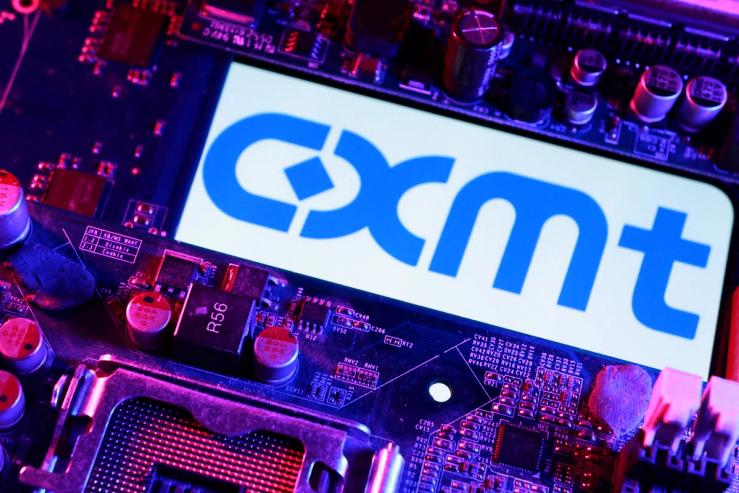 CXMT logo and computer motherboard are seen in this illustration.