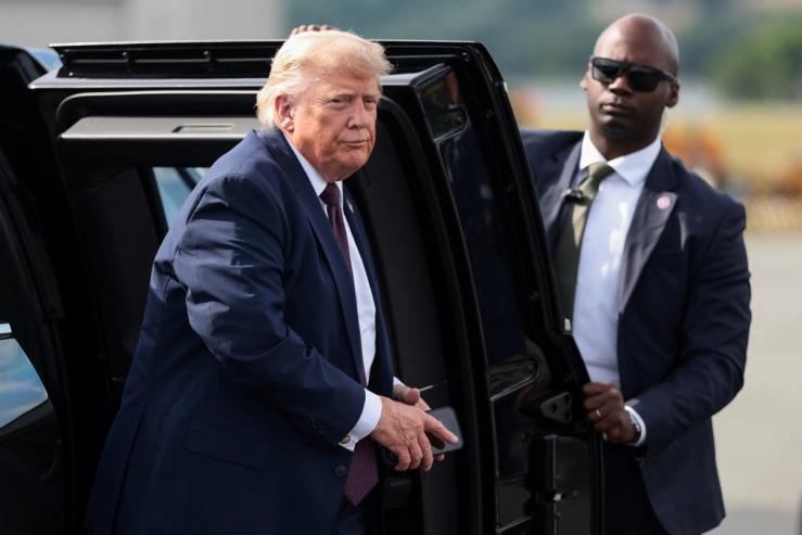 U.S. President Donald Trump arrives to depart Reading Regional Airport in Reading, Pennsylvania