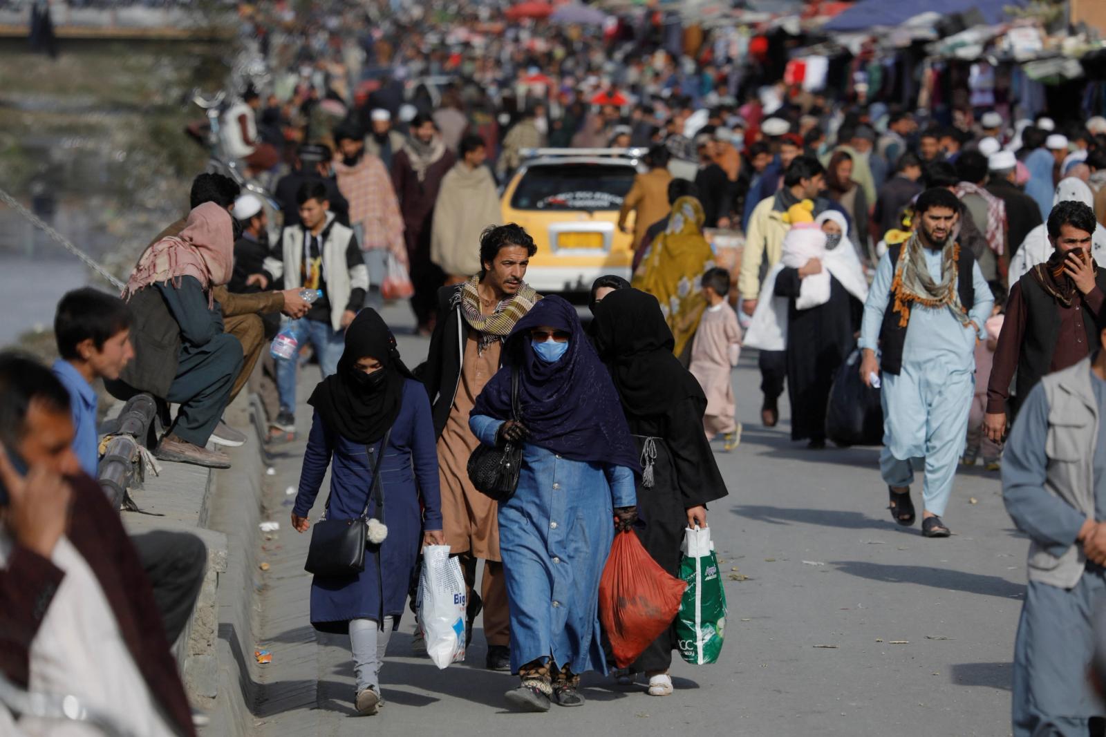 People walk in a street in Kabul, Afghanistan, November 9, 2022.