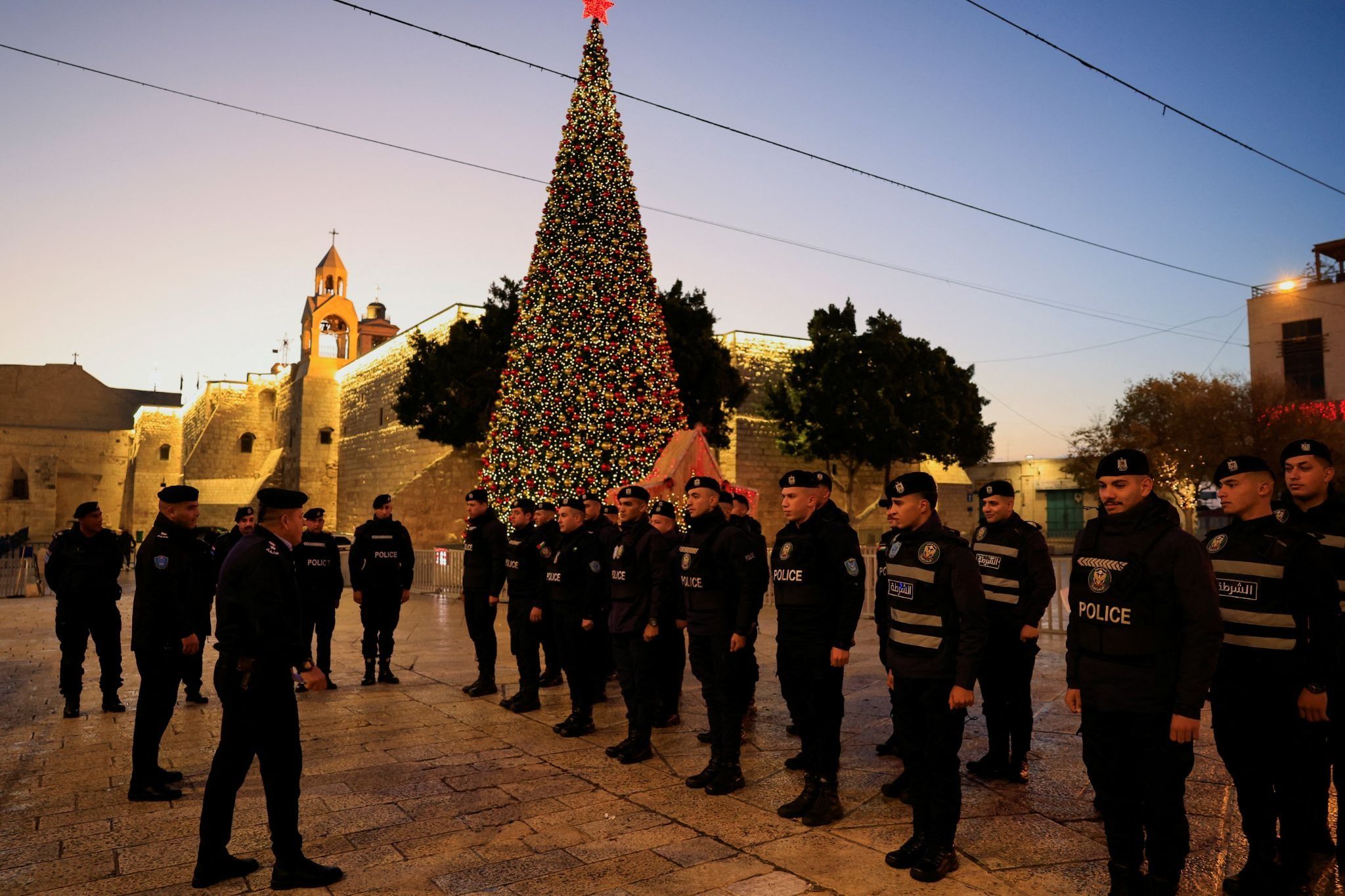 Palestinian policemen take position ahead of the arrival of the Latin Patriarch of Jerusalem to Bethlehem. 