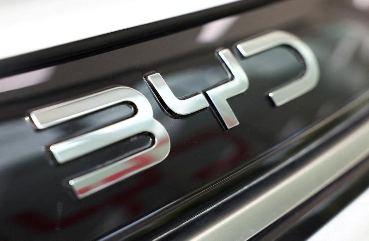 A BYD logo is displayed on a car at a dealership in Sant Cugat del Valles, near Barcelona