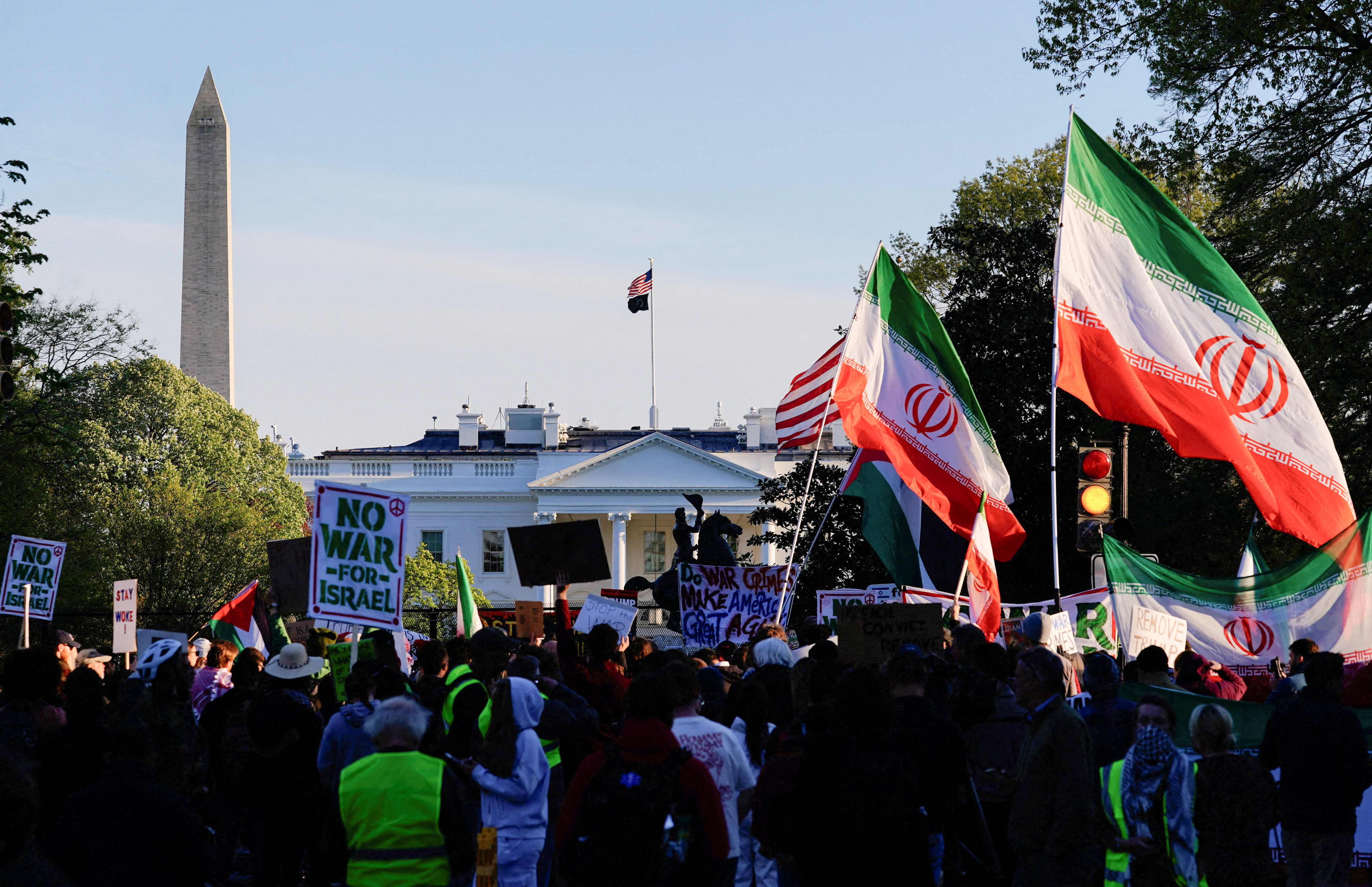 Demonstrators protest against military action in Iran after Trump said that he had agreed to a two-week ceasefire with Iran. 