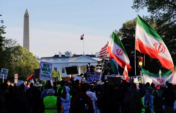 Demonstrators protest against military action in Iran after Trump said that he had agreed to a two-week ceasefire with Iran.