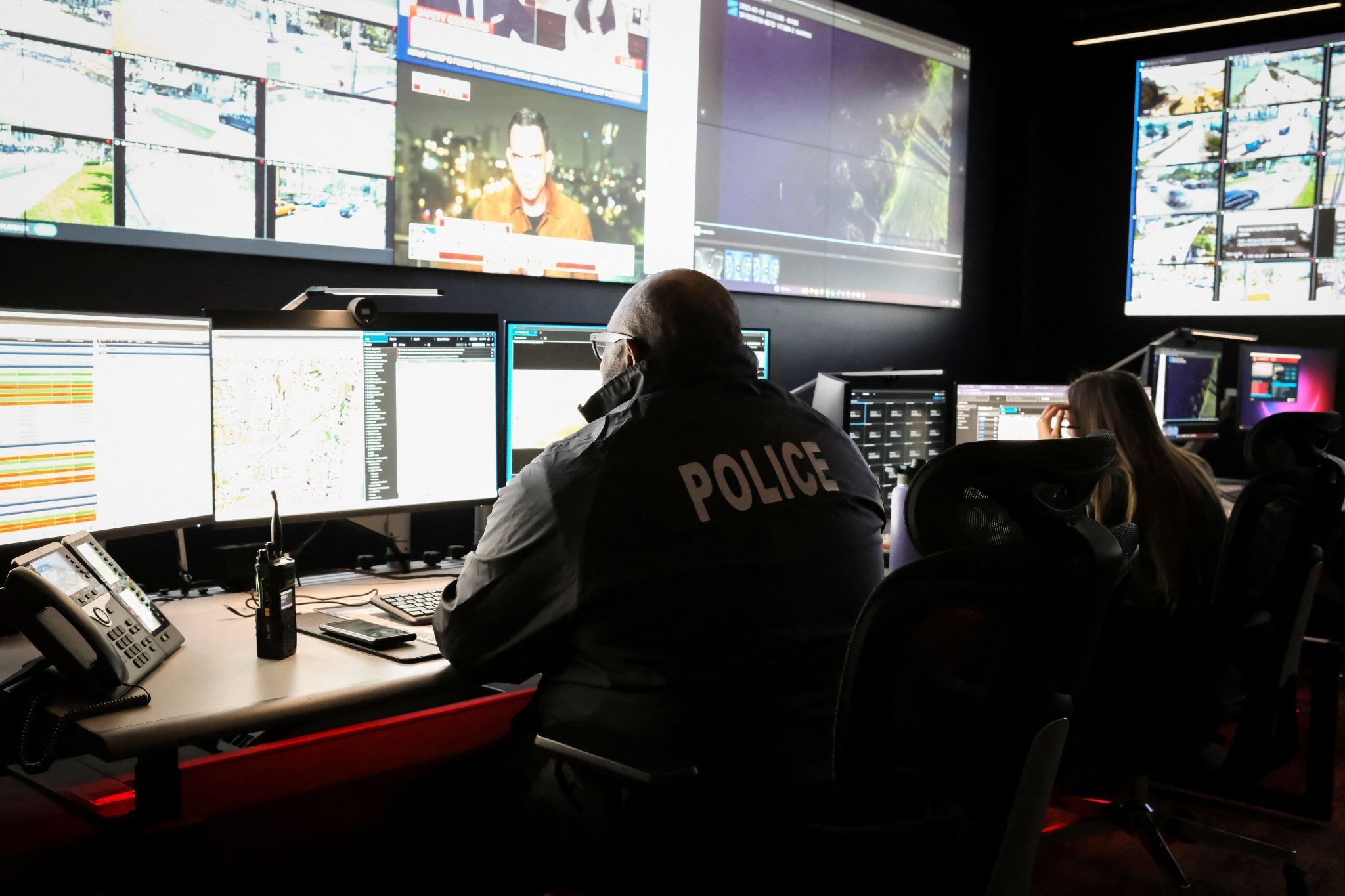 Miami Beach police officers perform surveillance and intelligence operations.