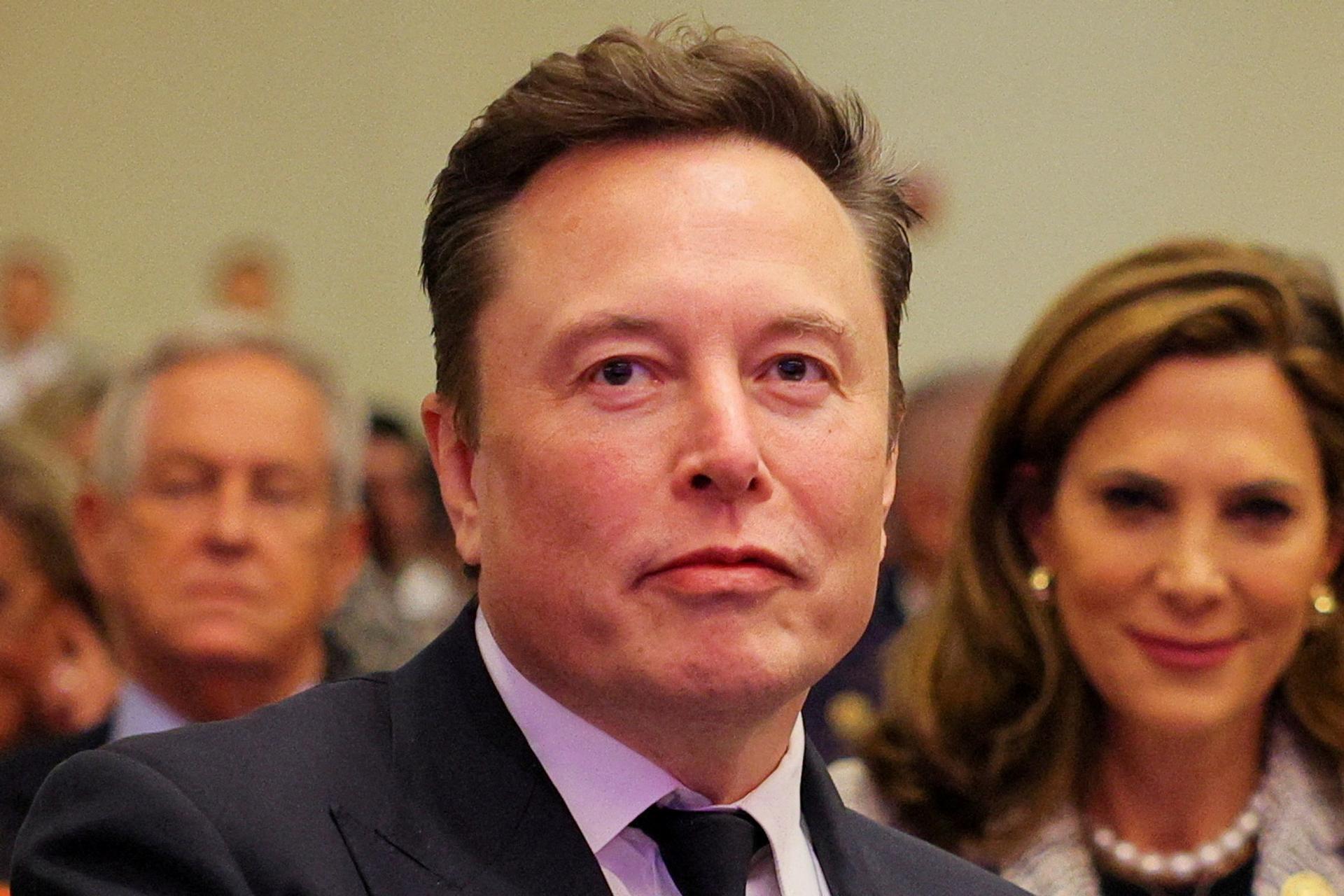 Tesla CEO and X owner Elon Musk sits as U.S. President-elect Donald Trump meets with House Republicans on Capitol Hill in Washington