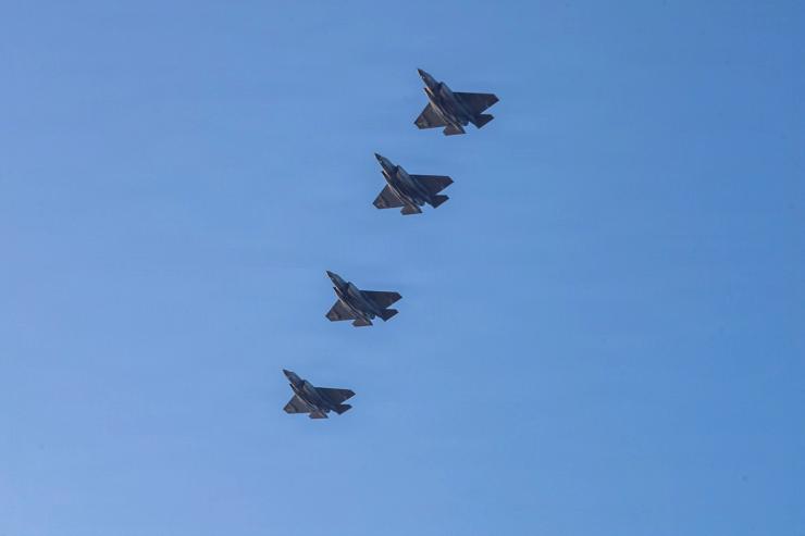 U.S. Navy aircraft fly over the flight deck of the Nimitz-class aircraft carrier USS Abraham Lincoln in support of the Operation Epic Fury attack on Iran from an undisclosed location March 3, 2026.