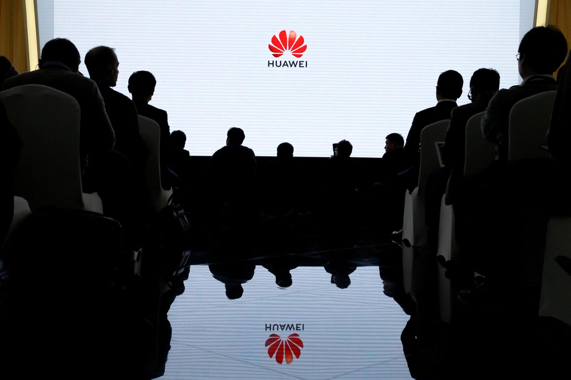  People attend a product presentation at Huawei in Beijing, China, in 2019