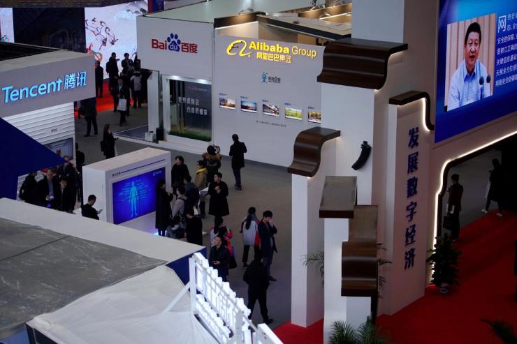 Tencent and Alibaba exhibitioners’ displays at convention in Wuzhen