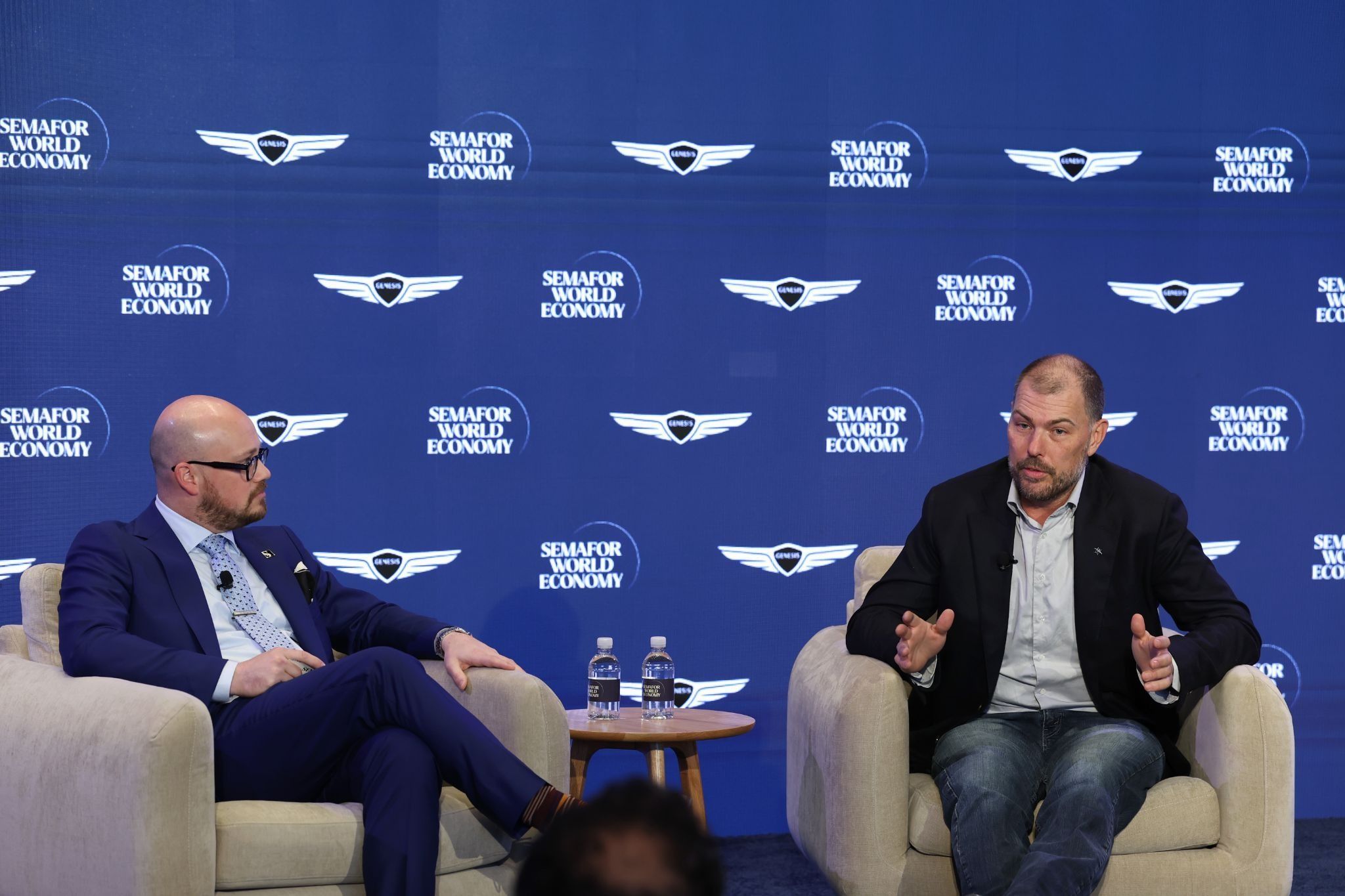 Kyle Clark (R) and Semafor’s Tim McDonnell. 