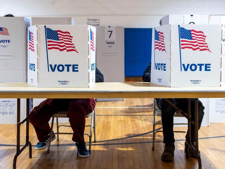 Voters at a polling station in Lansing, MI, USA.