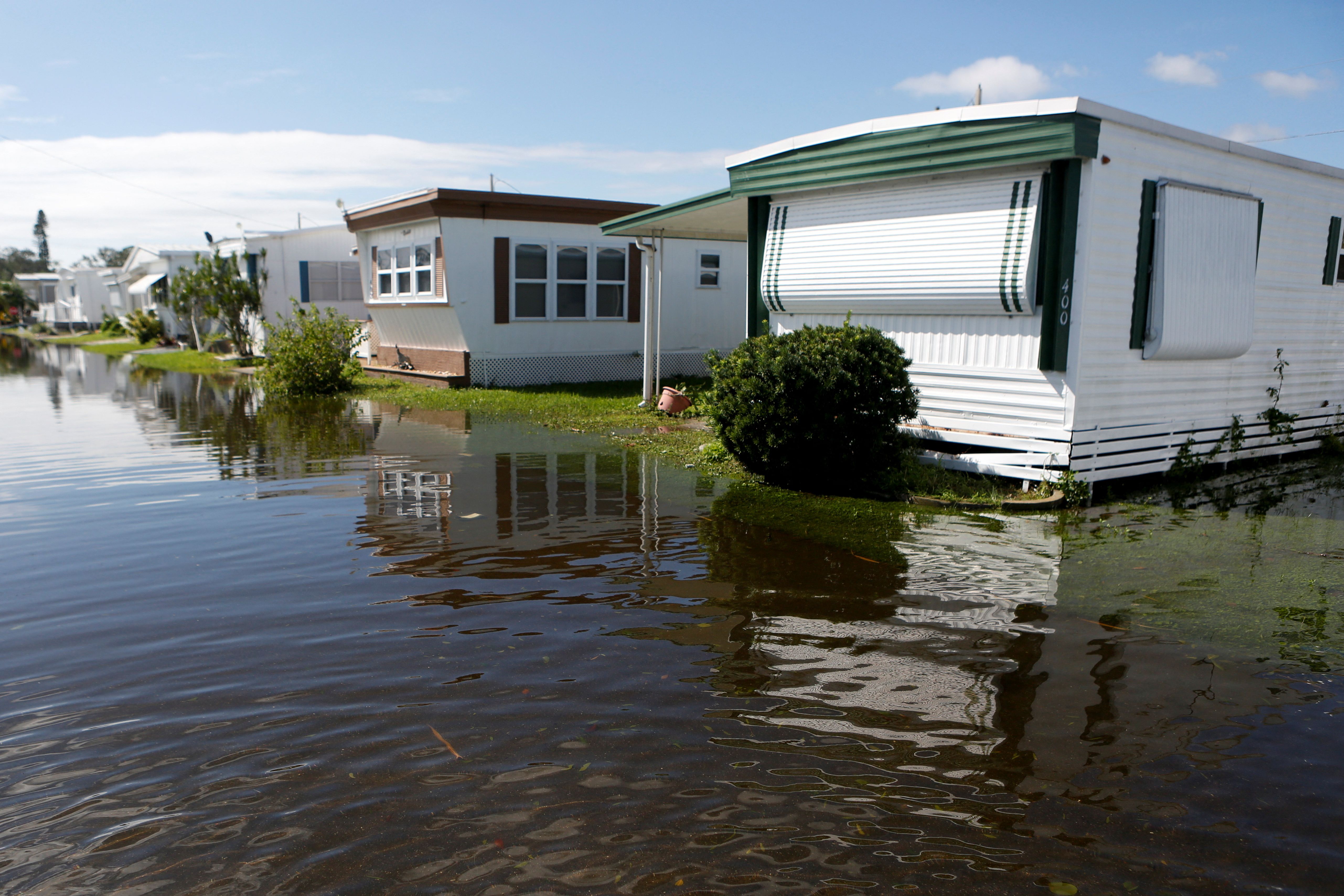 A view shows mobile homes surrounded by flood water after Hurricane Milton made landfall, in St. Petersburg, Florida